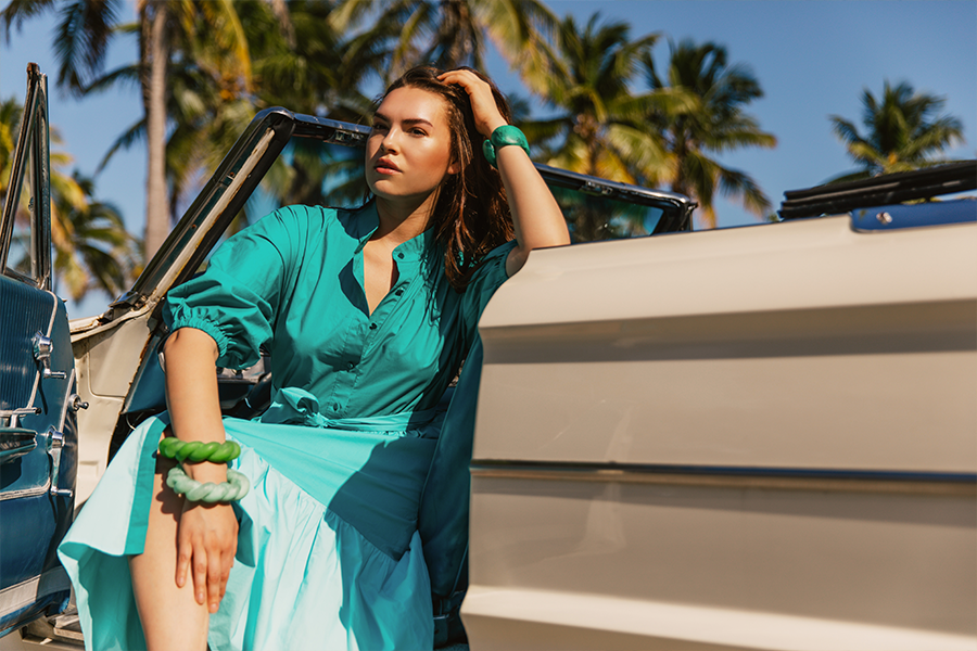 model wearing Bohemian Traders’ Dolman Shirt Dress